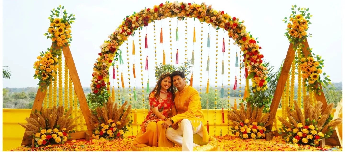 Haldi under the floral arch at Mangli Lake Farm