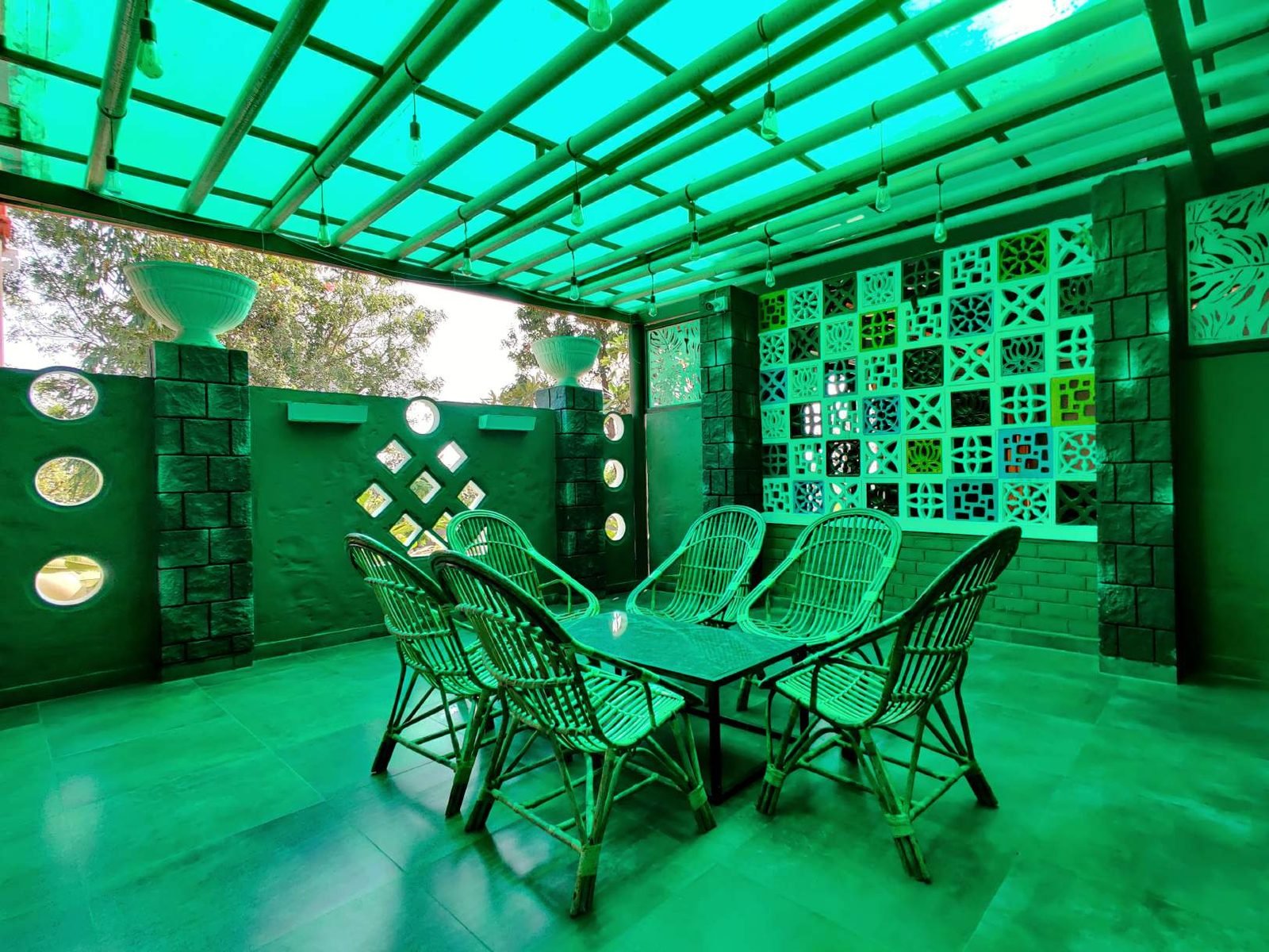 Garden pergola dining at Mangli Lake Farm