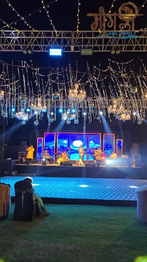 Sangeet on the lakeside stage at Mangli Lake Farm